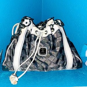 Pre-Owned Authentic vintage MCM Canvas & leather diamond pattern shoulder bag.